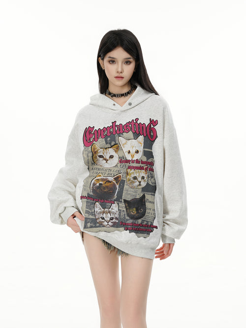 Female model styling the Heather Grey loose fit cat graphic hoodie