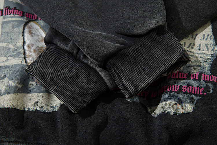 Ribbed cuff detail showing vintage washed fabric texture on black sweatshirt