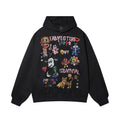 Front view of black oversized hoodie featuring all-over colorful graffiti and retro cartoon graphics.