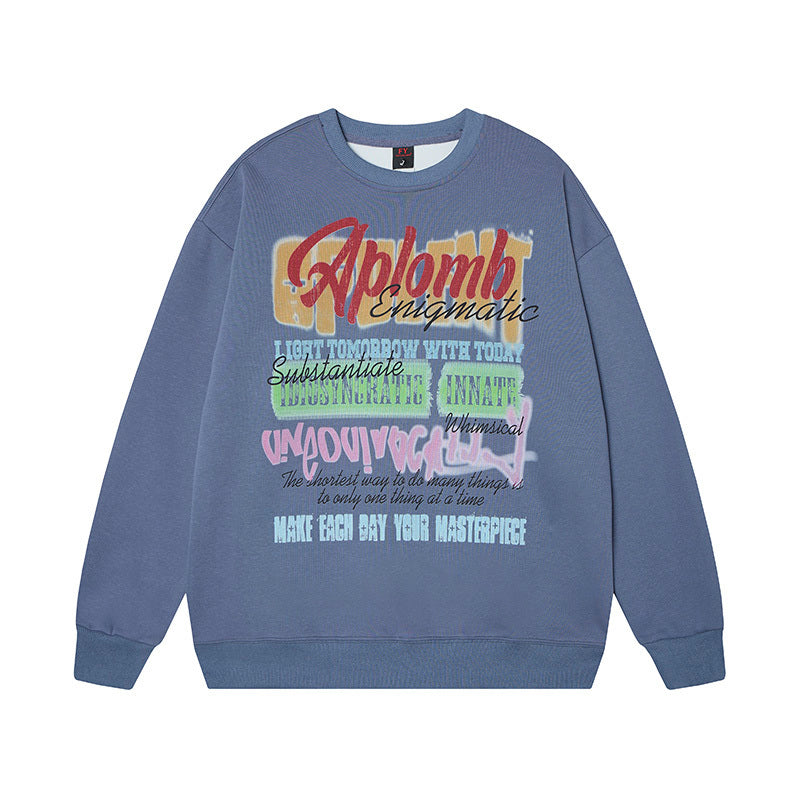 Slate Blue drop-shoulder sweatshirt with 'Make Each Day Your Masterpiece' slogan print.