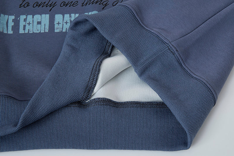Ribbed hem detail and soft inner lining of the sweatshirt ensuring comfort and warmth.