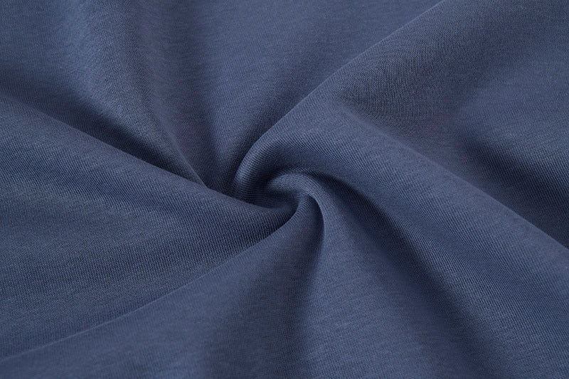 High-quality cotton polyester blend fabric detail with breathable texture and colorful graphic art.