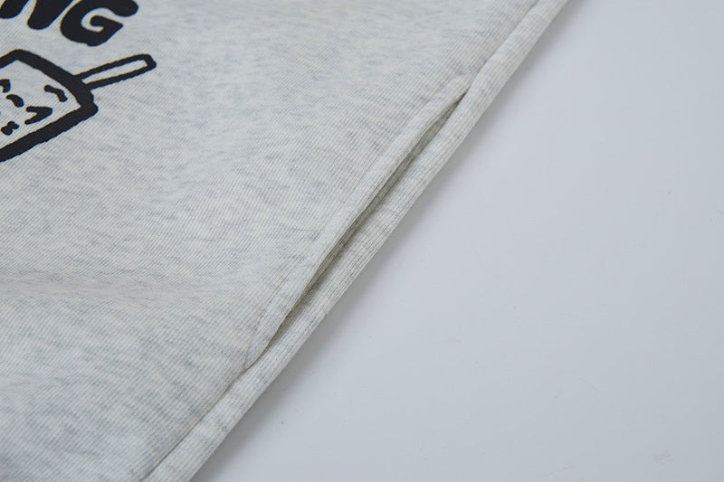 Gray fabric with a black logo of a rolling pin and pizza on a white background