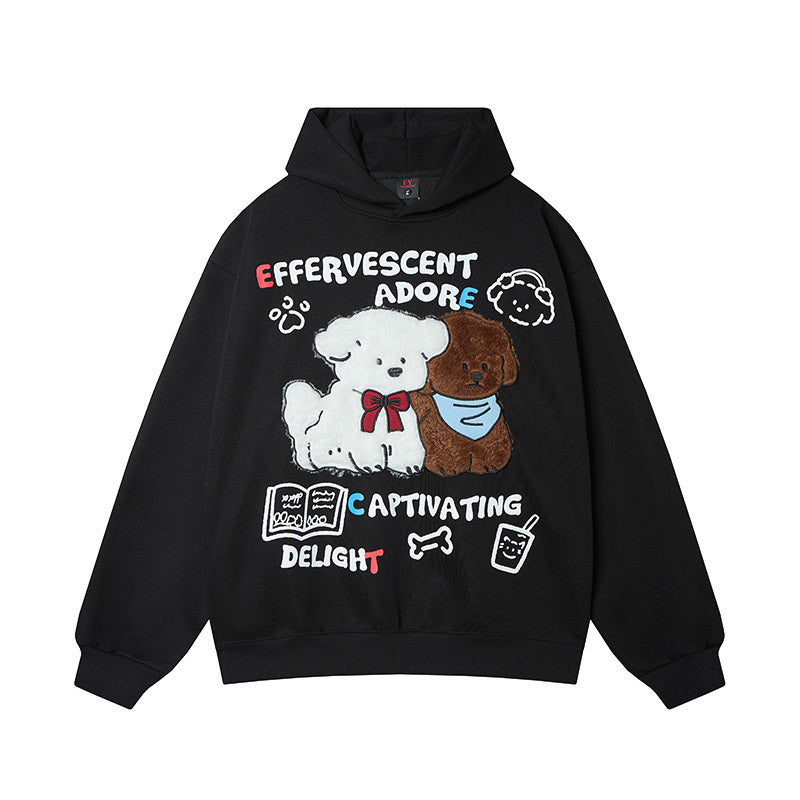 Front view of black oversized hoodie featuring cute fuzzy chenille puppy embroidery and colorful text.