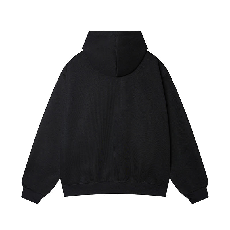 Back view of plain black cotton blend hoodie with drop shoulder design and ribbed hem.