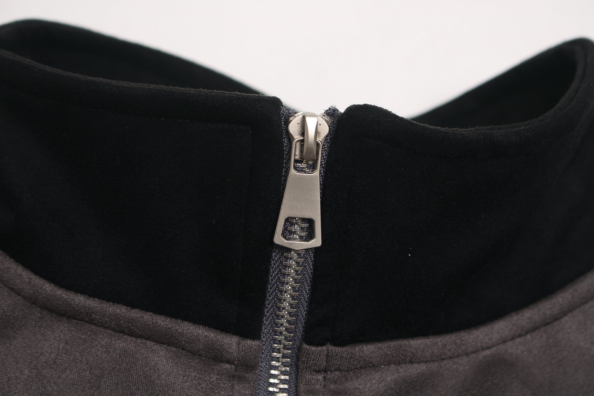 metal-zipper-pull-detail-high-neck