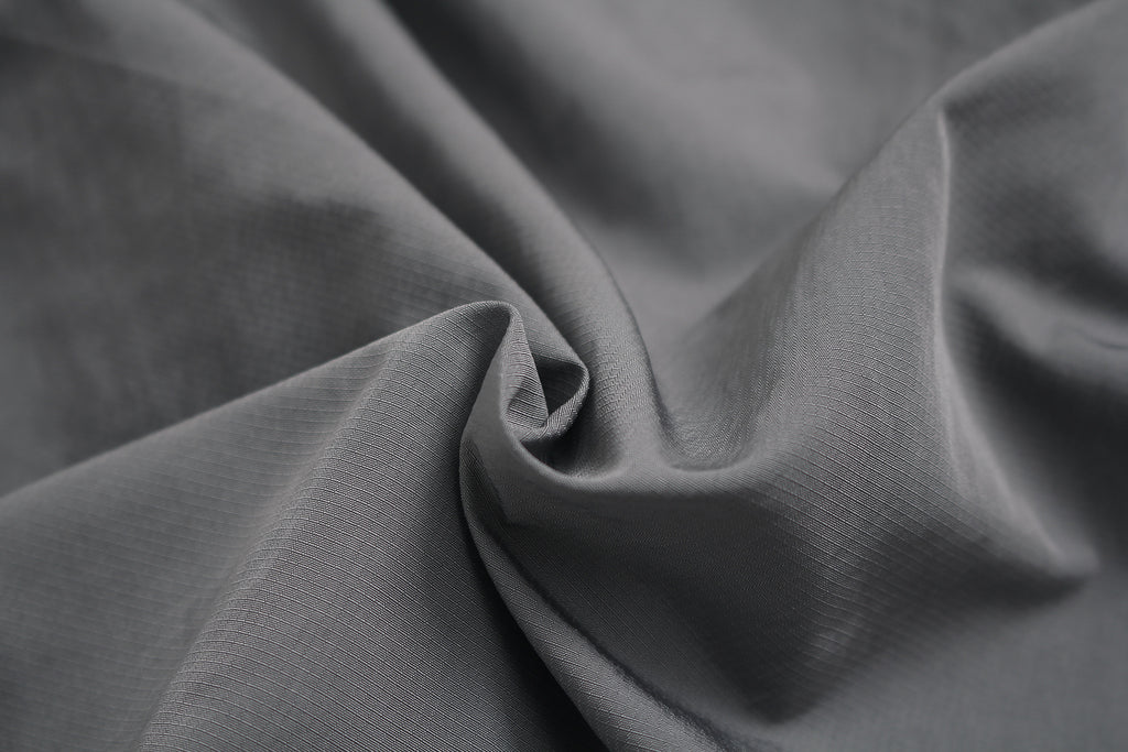 Texture of waterproof 60% nylon 40% polyester fabric.