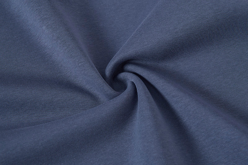 Close-up of blue fabric with folds